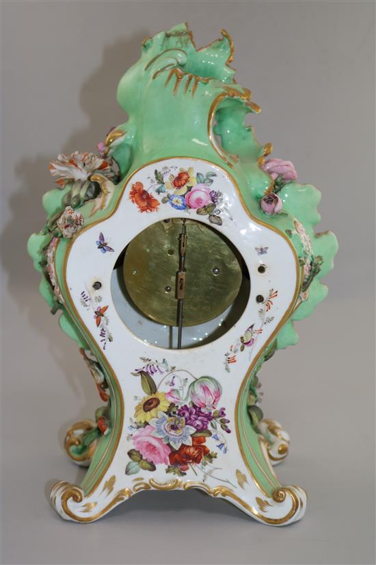 A Coalport floral encrusted mantel clock, with matching plinth, c.1830-5 17in.